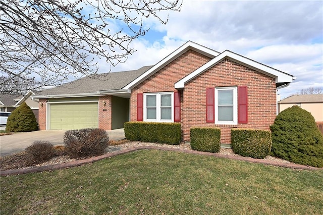 single story home featuring a front lawn, an attached garage, brick siding, and driveway