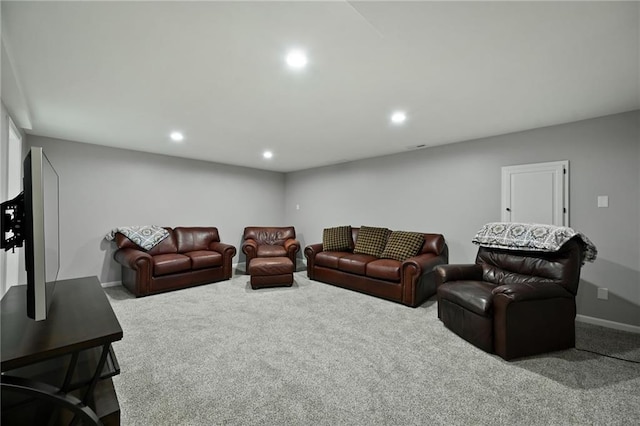 living area with recessed lighting, baseboards, and carpet floors