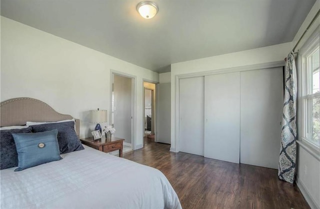 bedroom with a closet and wood finished floors