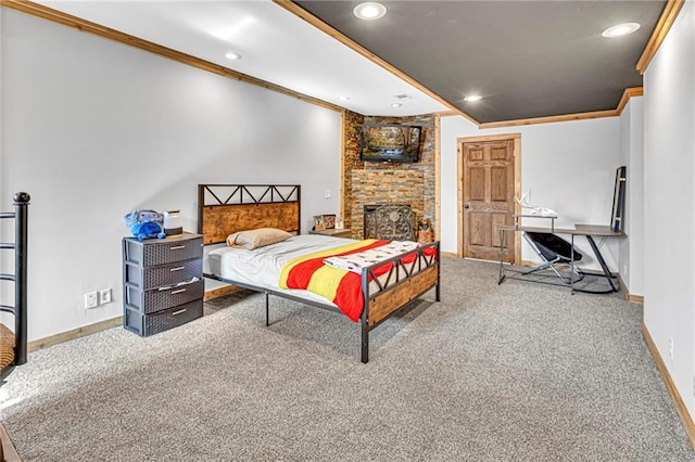 carpeted bedroom with recessed lighting, baseboards, a fireplace, and crown molding