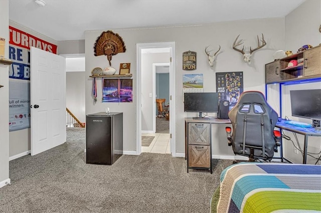 bedroom with carpet flooring and baseboards