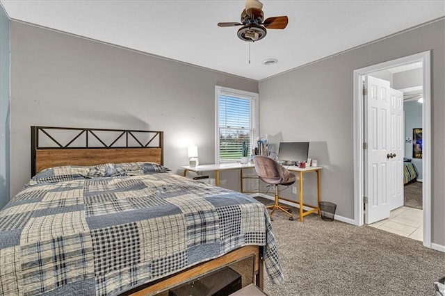 bedroom with visible vents, baseboards, carpet, and ceiling fan