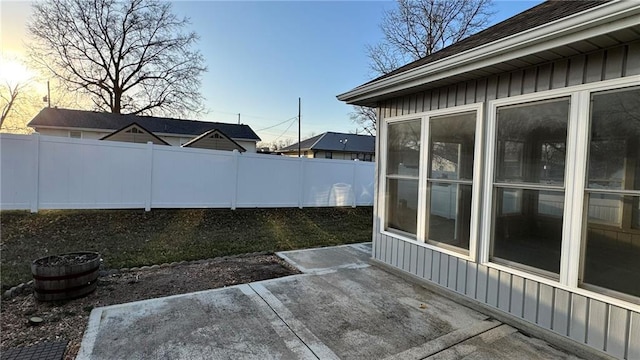 patio terrace at dusk with fence