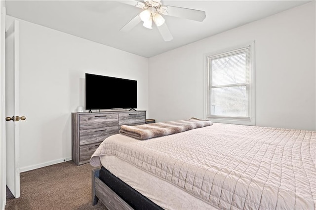 carpeted bedroom featuring ceiling fan and baseboards