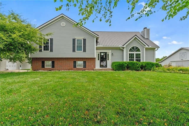 17701 C Hwy, Trimble, MO 64492 - tri-level home with a chimney, a front lawn, and a metal roof
