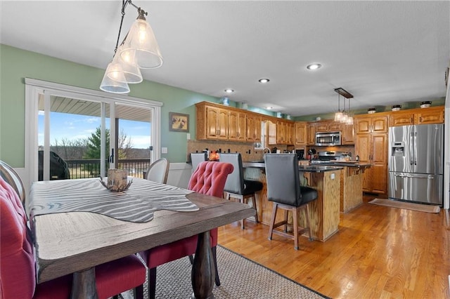 17701 C Hwy, Trimble, MO 64492 - dining area with light wood-type flooring and recessed lighting