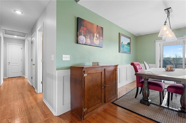 17701 C Hwy, Trimble, MO 64492 - dining room with light wood-style flooring and wainscoting
