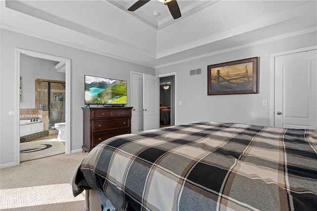 17701 C Hwy, Trimble, MO 64492 - carpeted bedroom with a tray ceiling, crown molding, ceiling fan, and ensuite bathroom