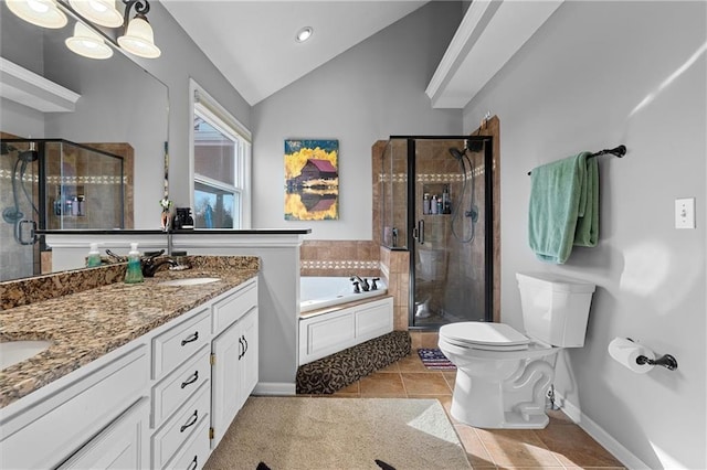 17701 C Hwy, Trimble, MO 64492 - bathroom featuring vaulted ceiling, a garden tub, a shower stall, double vanity, and tile patterned floors