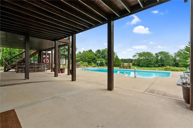 17701 C Hwy, Trimble, MO 64492 - swimming pool with a patio area, stairs, and view of scattered trees
