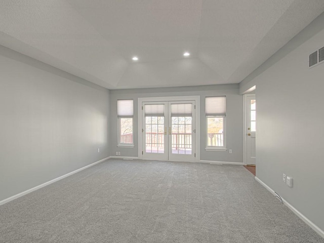 empty room with visible vents, recessed lighting, french doors, and baseboards