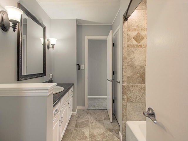 bathroom featuring vanity and crown molding