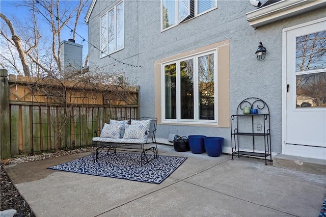 view of patio with fence