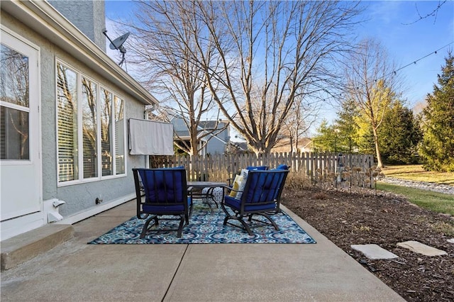 view of patio / terrace with fence