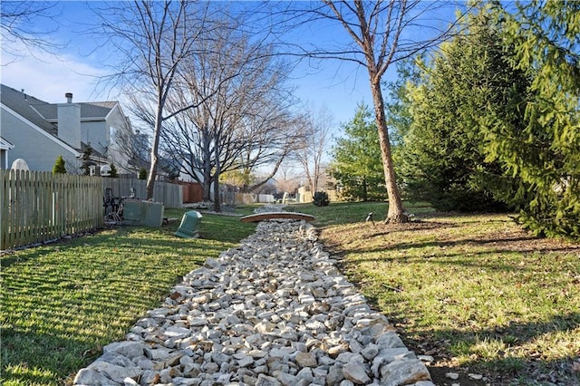 view of yard featuring fence