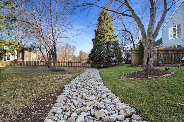 view of yard featuring fence