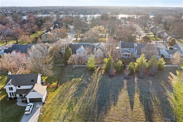 birds eye view of property with a residential view