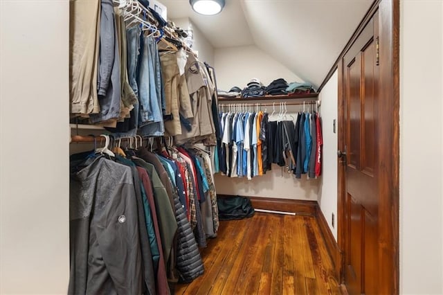 209 High St, Platte City, MO 64079 - walk in closet with vaulted ceiling and wood finished floors
