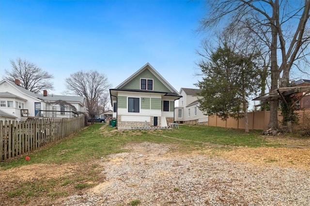 209 High St, Platte City, MO 64079 - back of property with fence