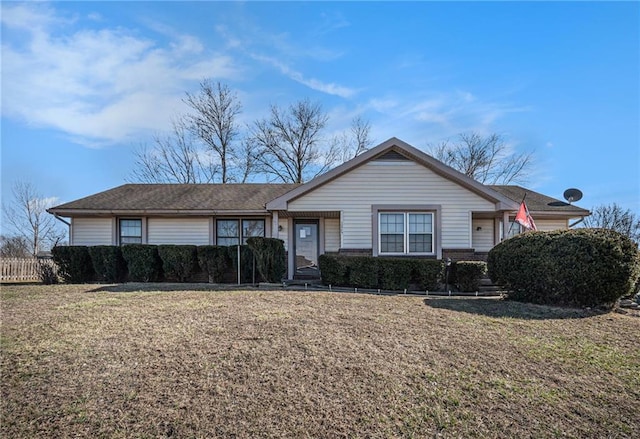 view of front of home featuring a front yard