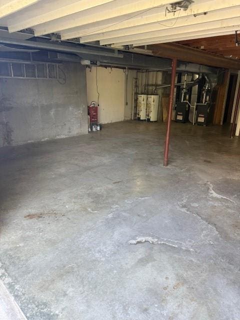 1507 W Concord Dr, Plattsburg, MO 64477 - unfinished basement featuring water heater