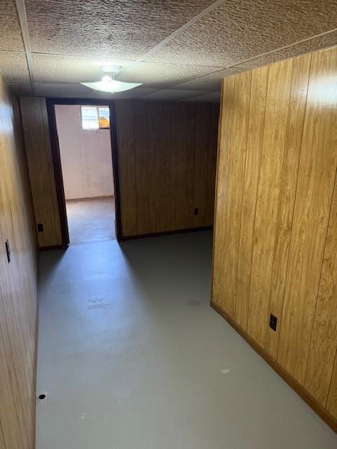 1507 W Concord Dr, Plattsburg, MO 64477 - interior space featuring a paneled ceiling and wooden walls