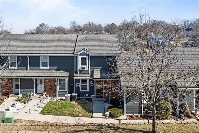 traditional home featuring central air condition unit