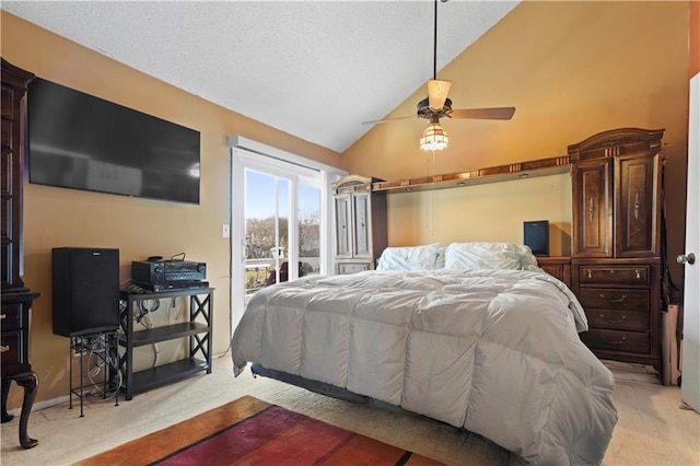 bedroom featuring ceiling fan, light colored carpet, vaulted ceiling, a textured ceiling, and access to outside