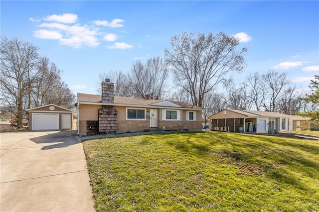 single story home featuring a front yard, a chimney, an outdoor structure, concrete driveway, and a detached garage