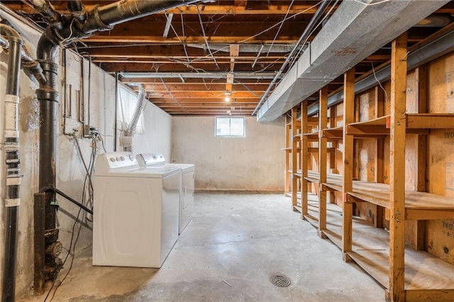 basement featuring washer and clothes dryer