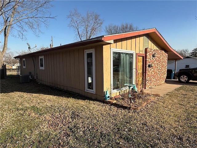 view of side of property with fence