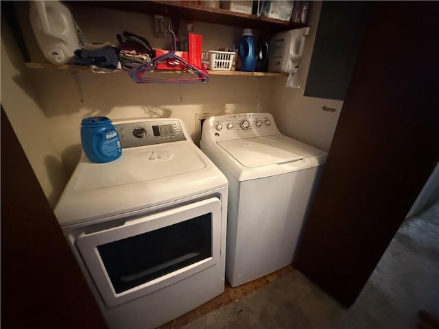 laundry room featuring independent washer and dryer and laundry area