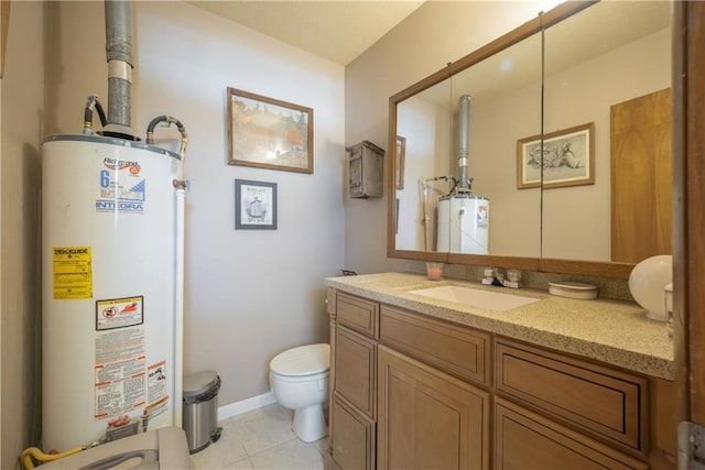 bathroom with tile patterned floors, vanity, water heater, and toilet