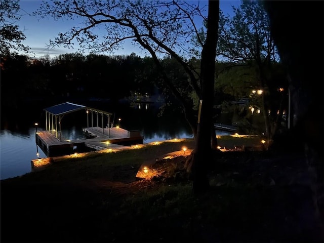 dock area featuring a water view