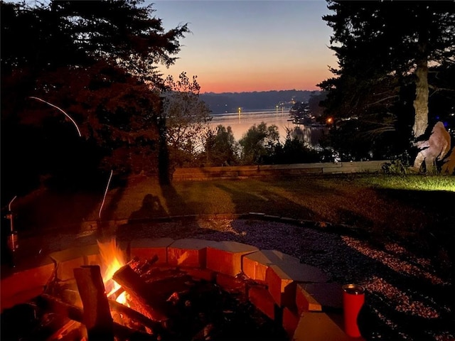 water view with a fire pit