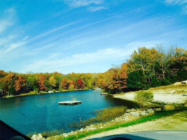 water view with a wooded view