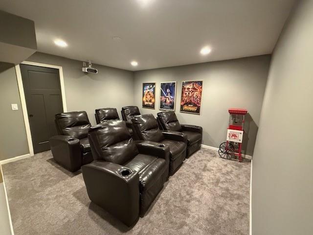 home theater room with carpet flooring, recessed lighting, and baseboards