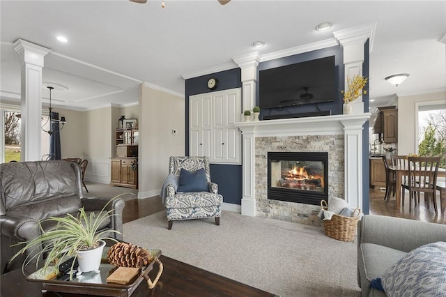 16520 NW 178th St, Platte City, MO 64079 - living area featuring ornate columns, a multi sided fireplace, wood finished floors, and ornamental molding