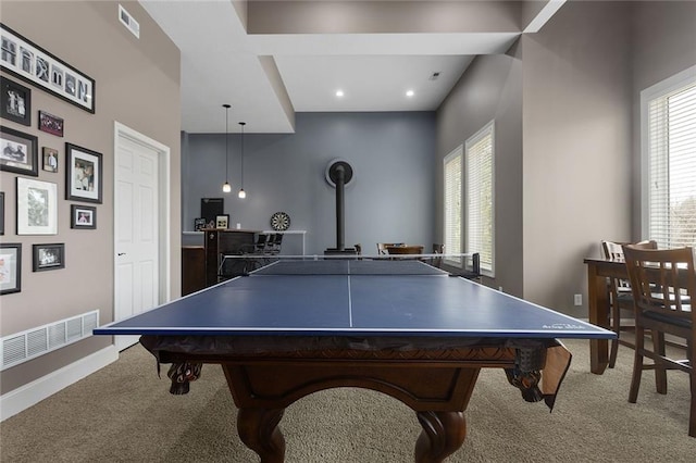 16520 NW 178th St, Platte City, MO 64079 - recreation room featuring carpet flooring, a wood stove, and recessed lighting