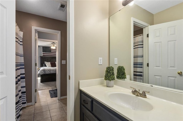 16520 NW 178th St, Platte City, MO 64079 - ensuite bathroom featuring vanity, tile patterned floors, and ceiling fan