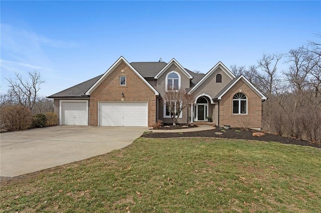 16520 NW 178th St, Platte City, MO 64079 - traditional-style home with driveway, brick siding, a front yard, and a garage
