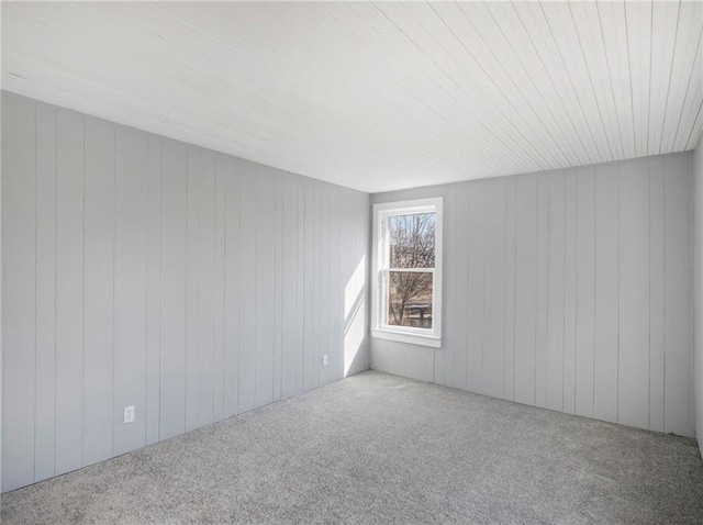 empty room with carpet flooring