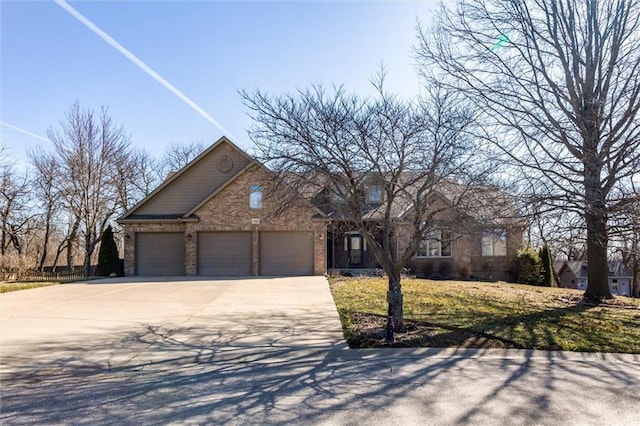 view of front of house featuring concrete driveway, an attached garage, brick siding, and a front lawn