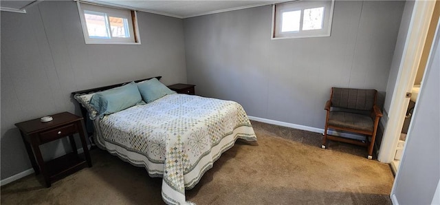 bedroom featuring multiple windows, baseboards, and carpet floors