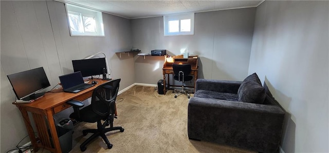 office space with plenty of natural light, carpet, and baseboards