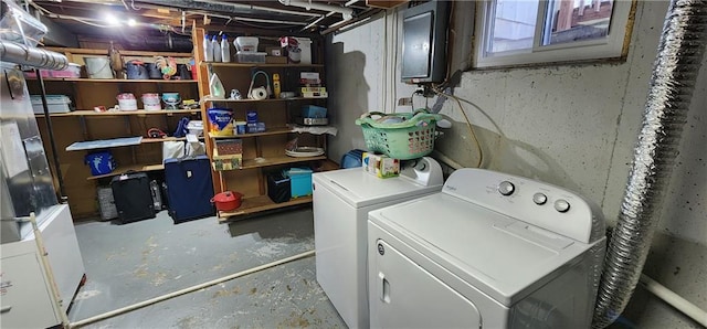 washroom with washer and clothes dryer and laundry area