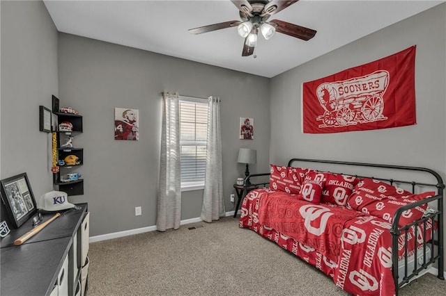 bedroom featuring a ceiling fan, baseboards, and carpet floors