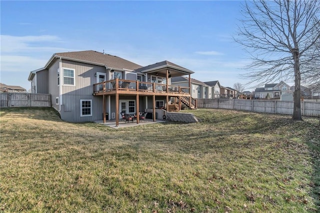 back of house featuring a wooden deck, a fenced backyard, stairs, and a patio area