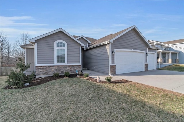 ranch-style home with driveway, stone siding, a front yard, and an attached garage