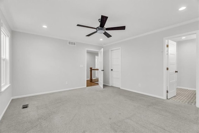 interior space featuring visible vents, ceiling fan, and carpet flooring